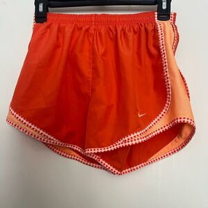 Nike Women's Vibrant Orange Athletic Shorts